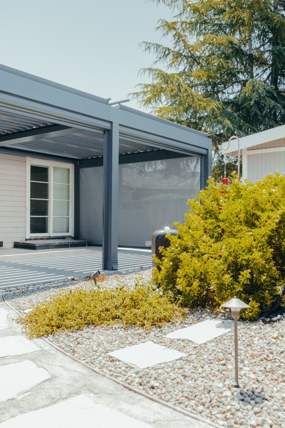 Attached pergola with lowered zip screen